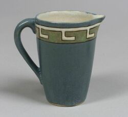 Saturday Evening Girls Pottery Pitcher